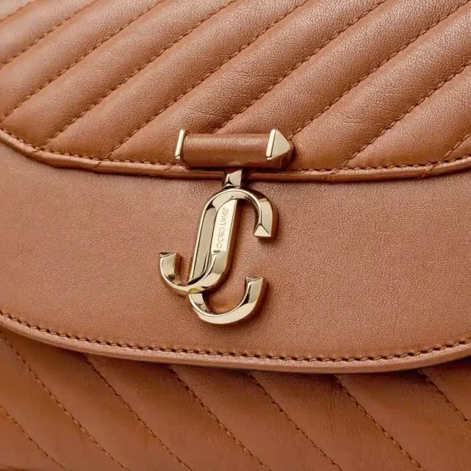 Curve Top Handle Tan Quilted Biker Leather Top Handle Bag with Pearl Detail Curve Top Handle Tan Quilted Biker Leather Top Handle Bag with Pearl Detail
